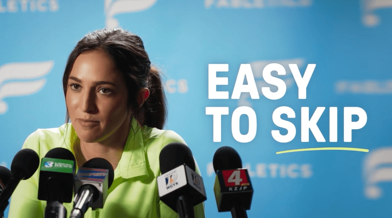 Fabletics spokesperson highlighting how to cancel membership or skip the month easily in this 2026 informational video still